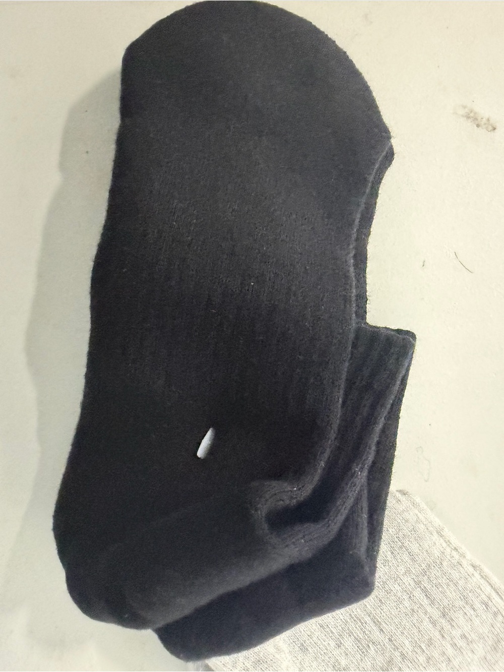 One pair Bombas  black socks no size listed measures toe to heel 7 1/2 in nwot